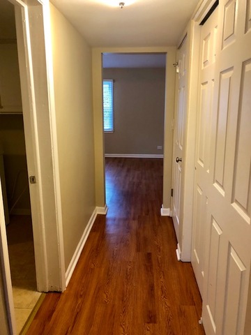 40 Valley Road Glen Ellyn, IL 60137 - Photo 8 of 24 a view of a hallway with wooden floor