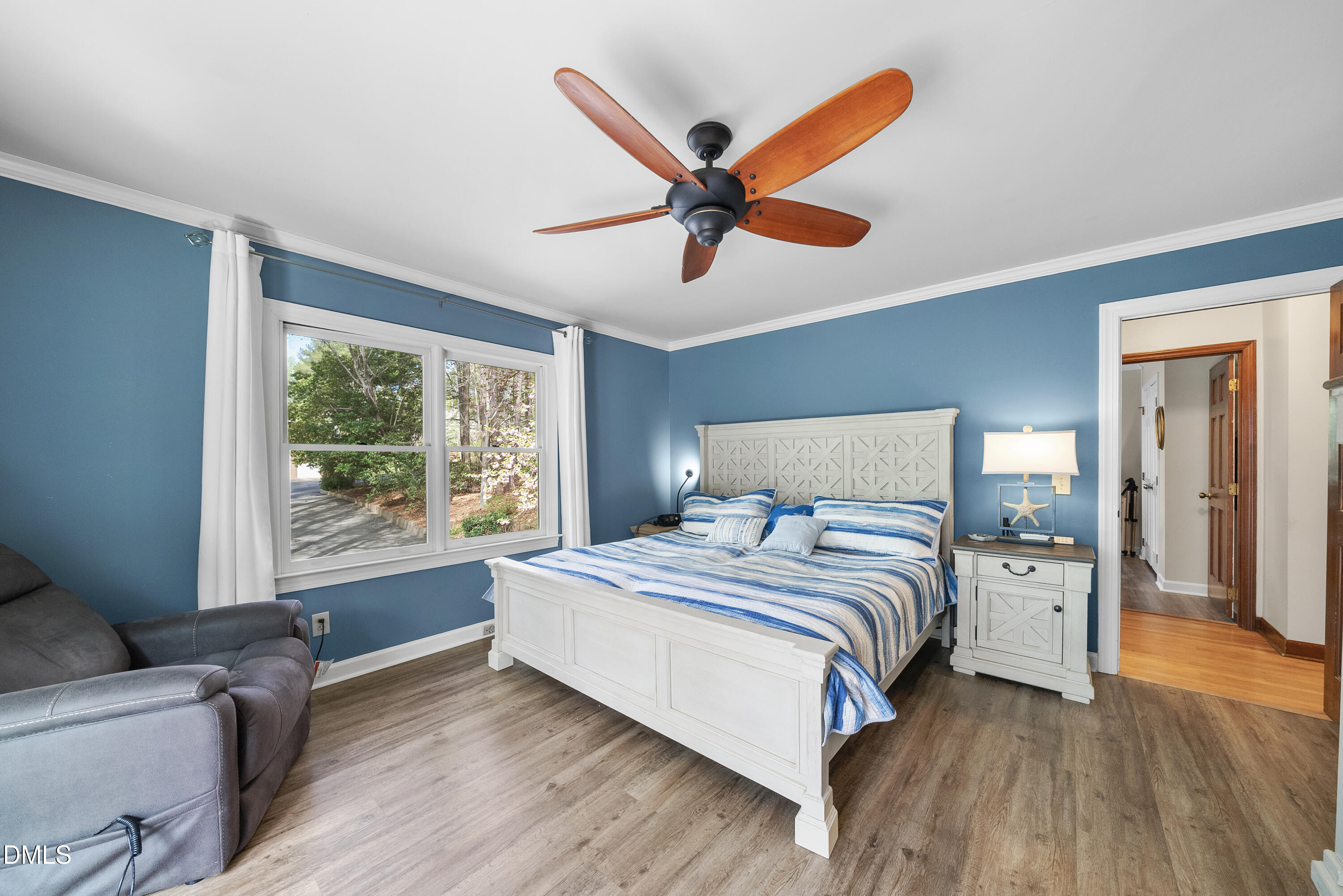 6200 Splitrock Trail Apex, NC 27539 - Photo 19 of 64 a bedroom with a large bed and a large window