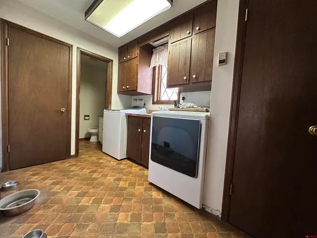 a view of a kitchen with a sink