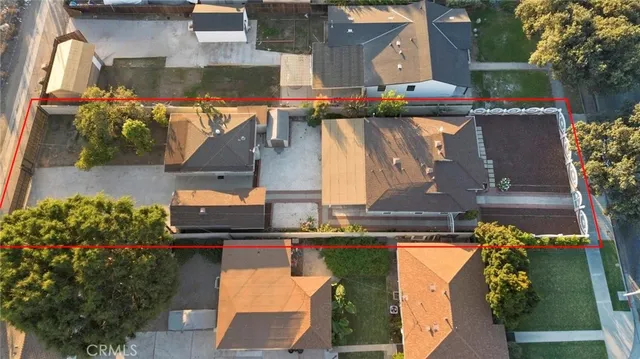 a view of a house with a yard and garage