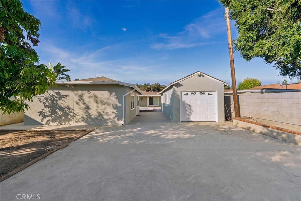 1104 Williamson Avenue Fullerton, CA 92833 - Photo 18 of 75 a front view of a house with a yard and garage