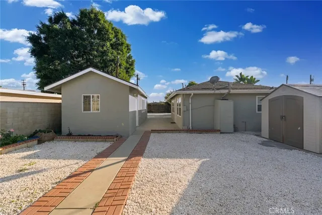 a view of an empty room and a window