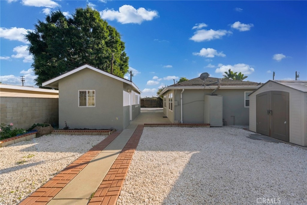 1104 Williamson Avenue Fullerton, CA 92833 - Photo 23 of 75 a view of a house with a yard and garage