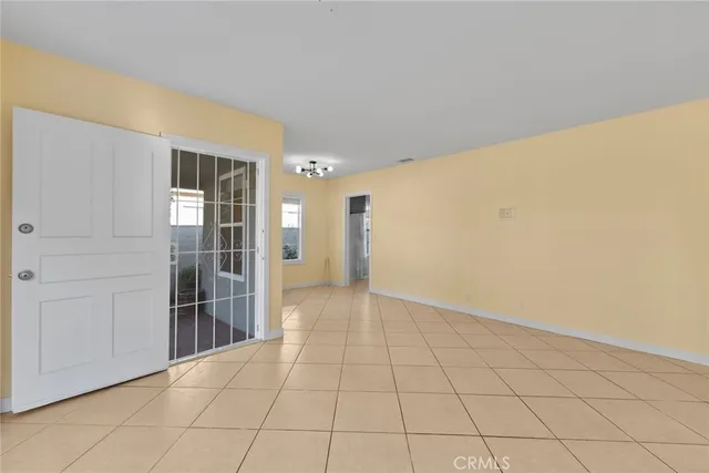 a view of an empty room and window