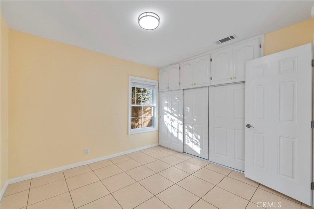 1104 Williamson Avenue Fullerton, CA 92833 - Photo 45 of 75 a view of an empty room with a window
