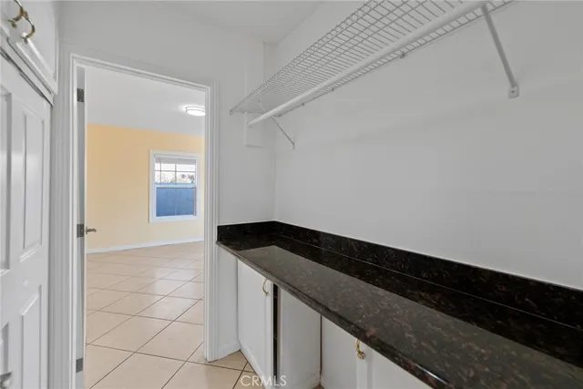 a bathroom with a toilet a sink and a mirror