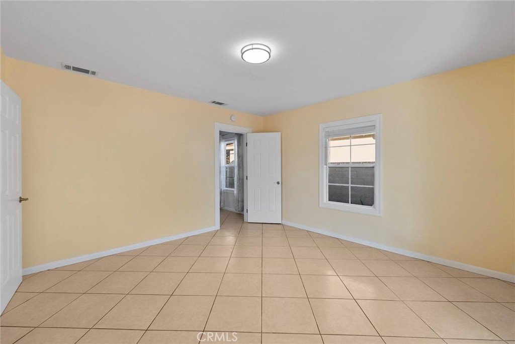1104 Williamson Avenue Fullerton, CA 92833 - Photo 52 of 75 a view of an empty room with a window