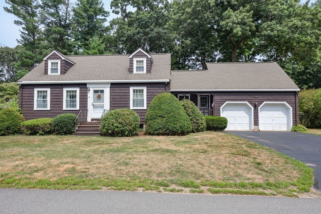 35 Walnut Road Chelmsford, MA 01824 - Photo 1 of 42 a front view of a house with yard