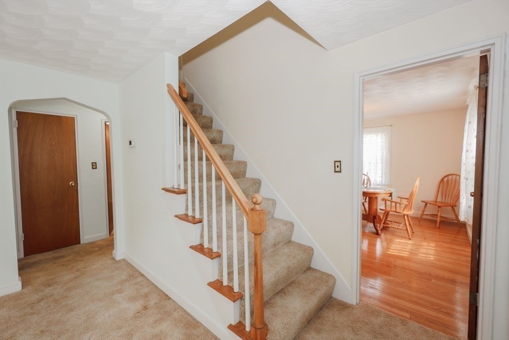 35 Walnut Road Chelmsford, MA 01824 - Photo 11 of 42 a view of entryway and dining room with furniture