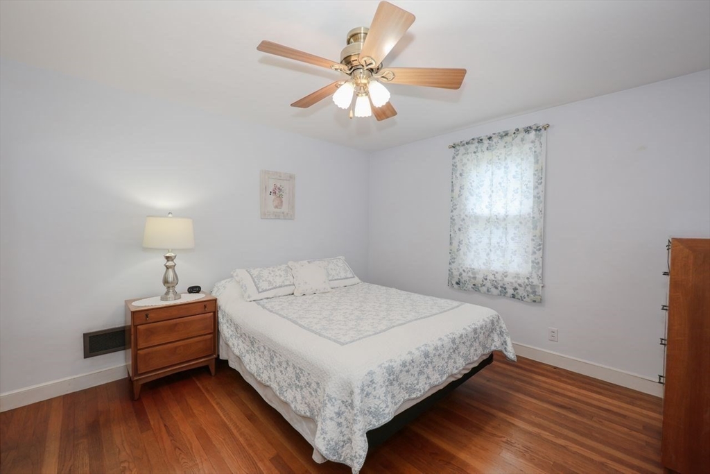 35 Walnut Road Chelmsford, MA 01824 - Photo 14 of 42 a bedroom with a bed and window