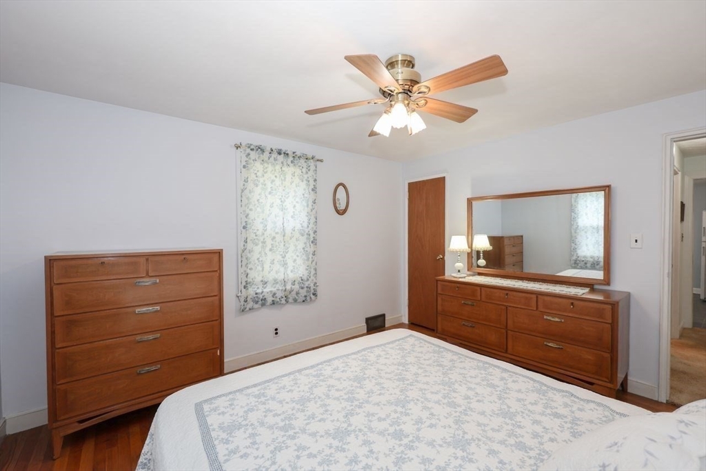 35 Walnut Road Chelmsford, MA 01824 - Photo 15 of 42 a bedroom with a bed and a dresser