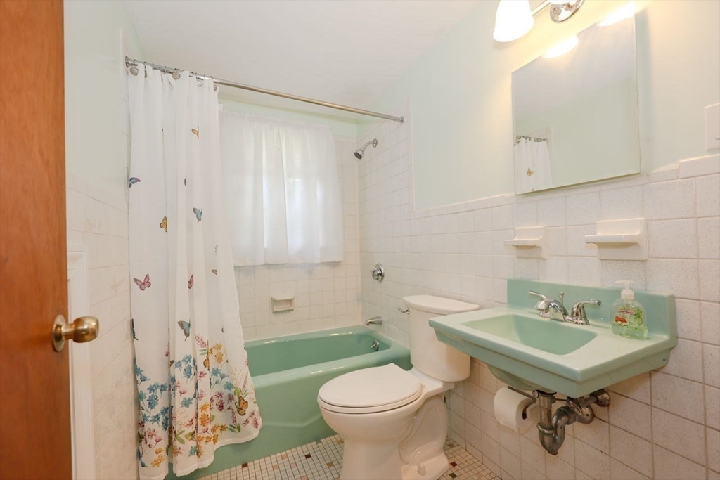 35 Walnut Road Chelmsford, MA 01824 - Photo 21 of 42 a bathroom with a sink toilet and shower