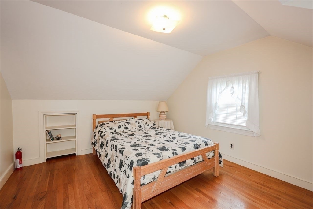 35 Walnut Road Chelmsford, MA 01824 - Photo 22 of 42 a bedroom with a bed and a window