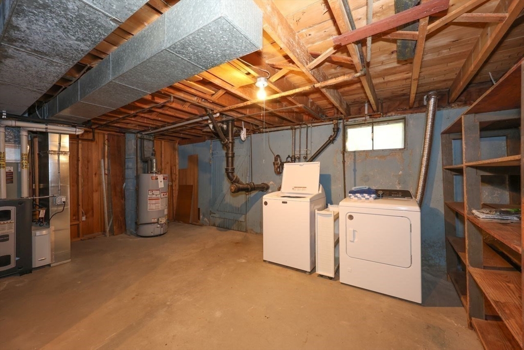 35 Walnut Road Chelmsford, MA 01824 - Photo 27 of 42 a view of a storage & utility room with washer and dryer