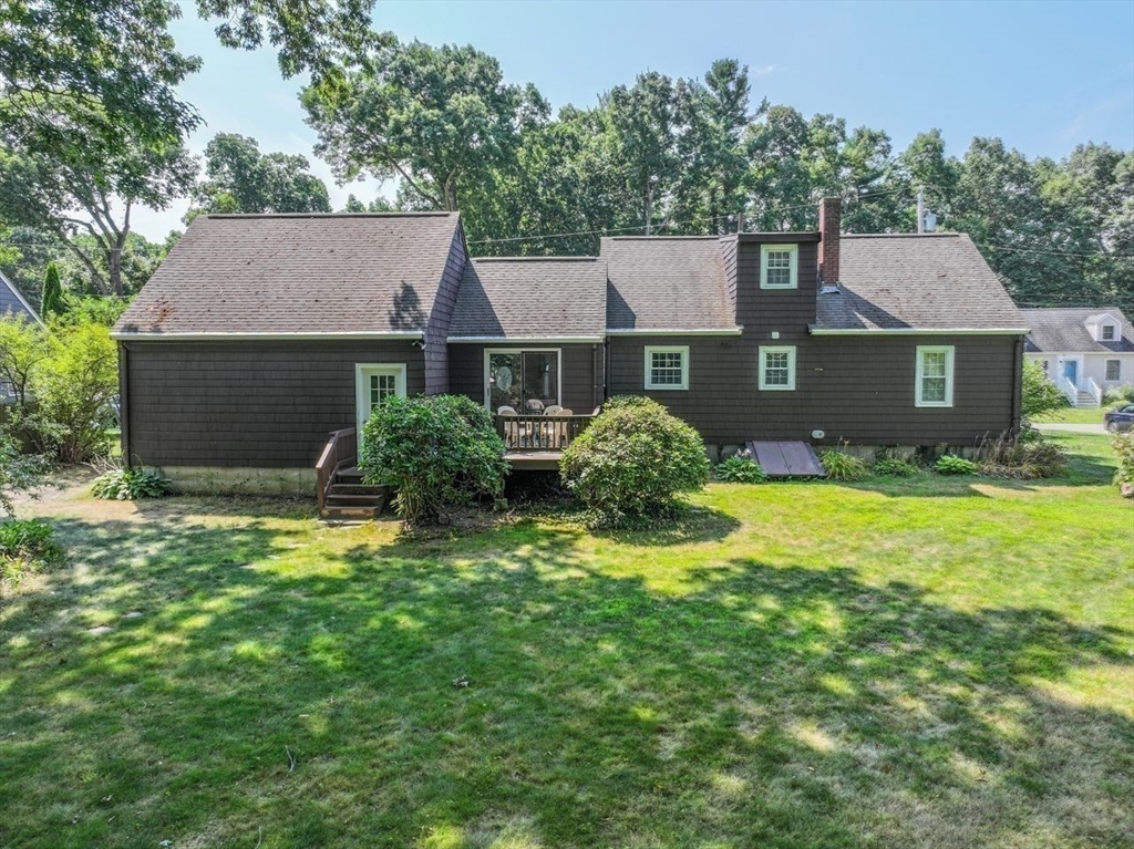 35 Walnut Road Chelmsford, MA 01824 - Photo 35 of 42 front view of a house with a yard