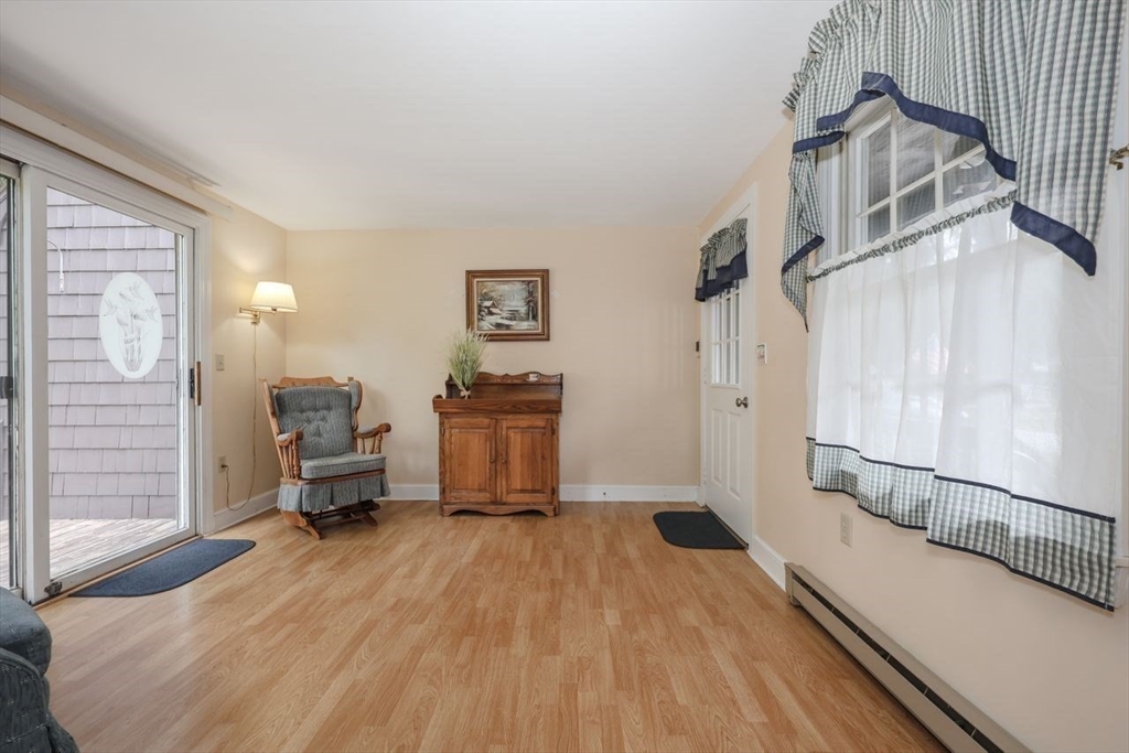 35 Walnut Road Chelmsford, MA 01824 - Photo 4 of 42 a living room with furniture and a wooden floor