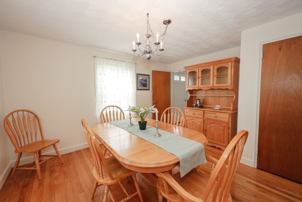 35 Walnut Road Chelmsford, MA 01824 - Photo 8 of 42 a view of a dining room with furniture window and wooden floor