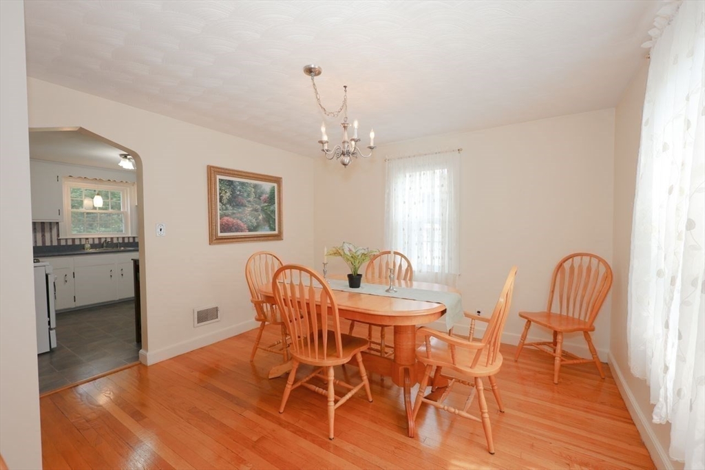 35 Walnut Road Chelmsford, MA 01824 - Photo 10 of 42 a view of a dining room with furniture and wooden floor