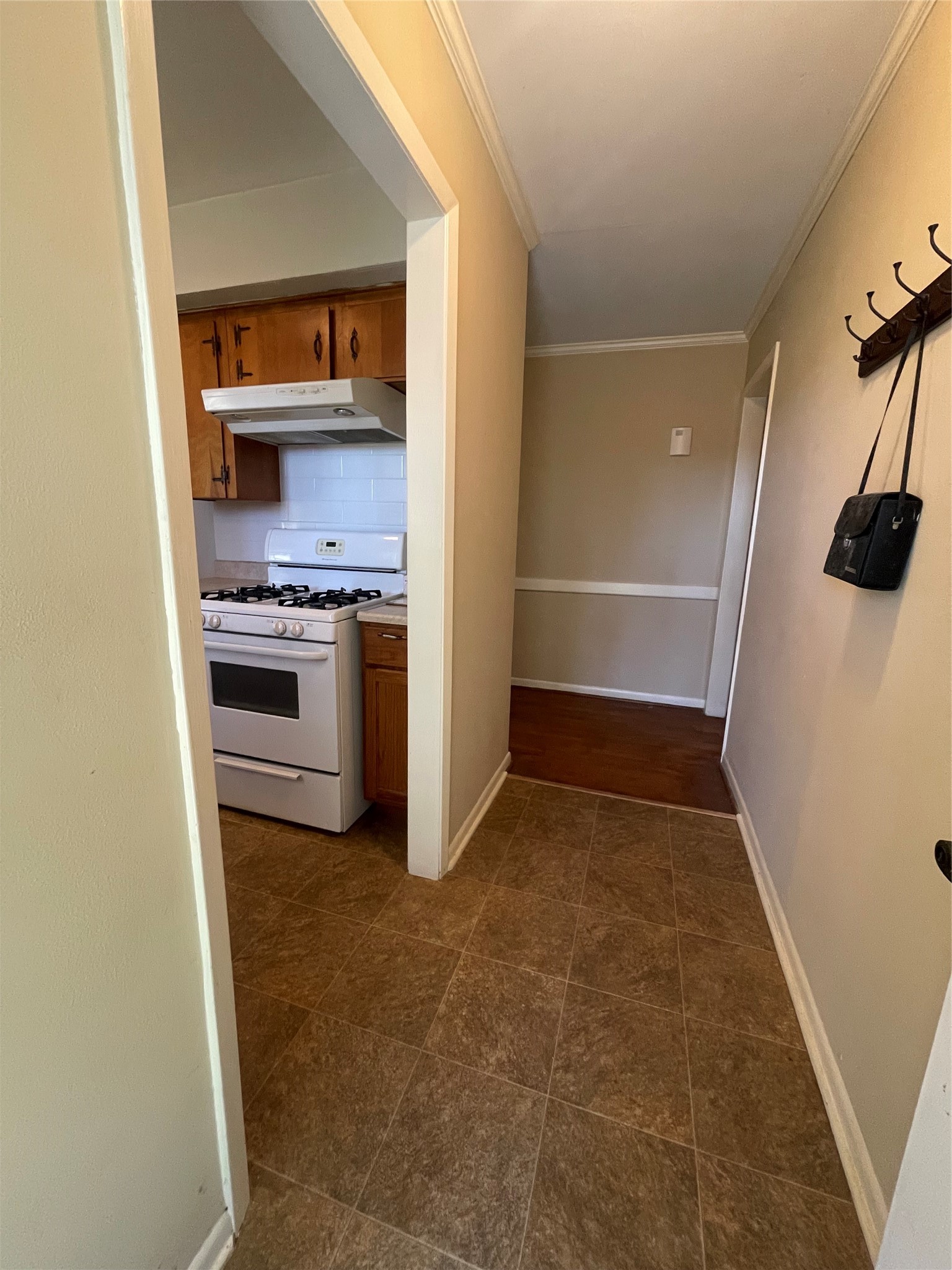 490 Cemetery Road Coldspring, TX 77331 - Photo 5 of 24 Entry way into home and opening to the kitchen