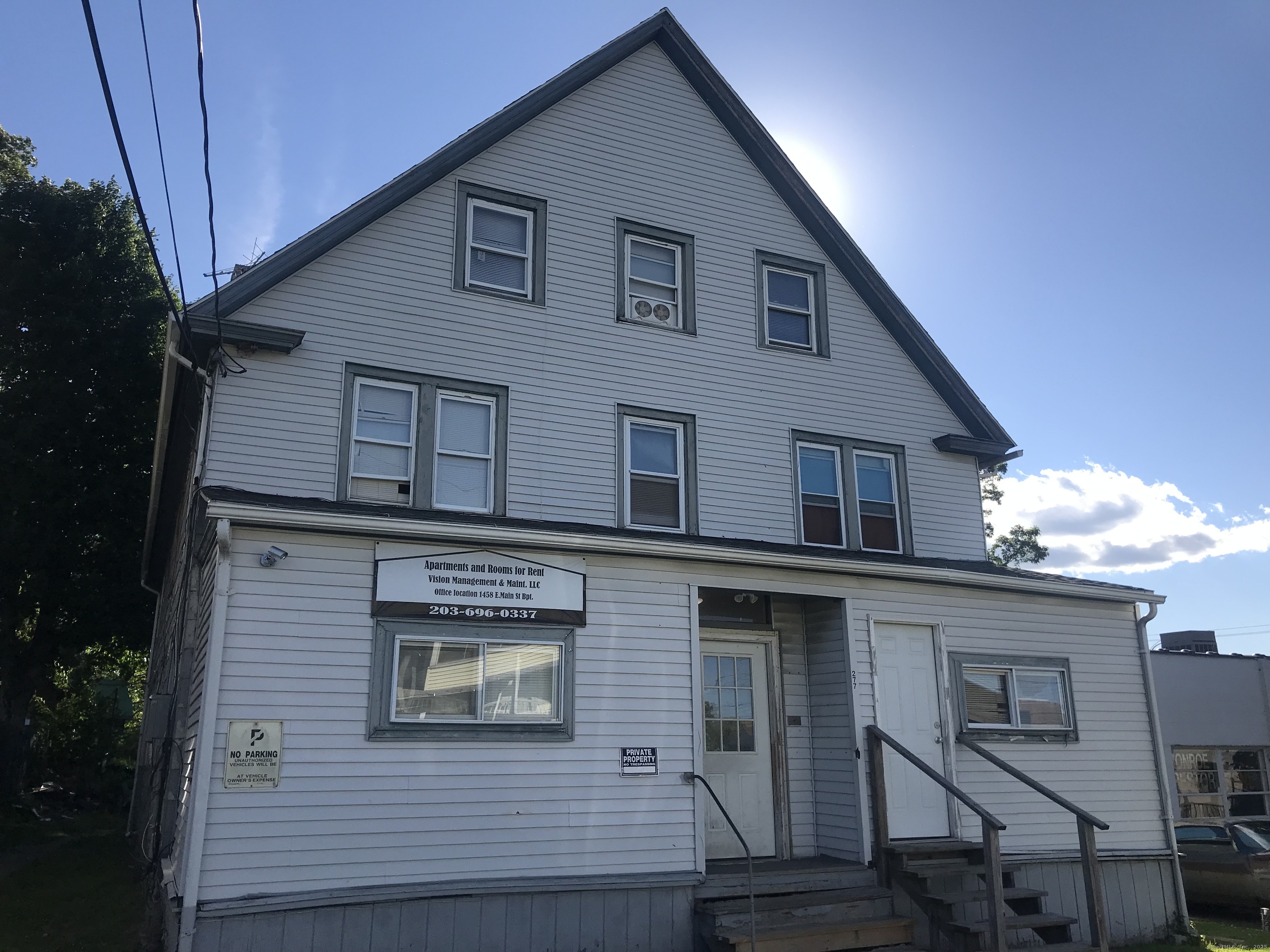 a front view of a house with a balcony