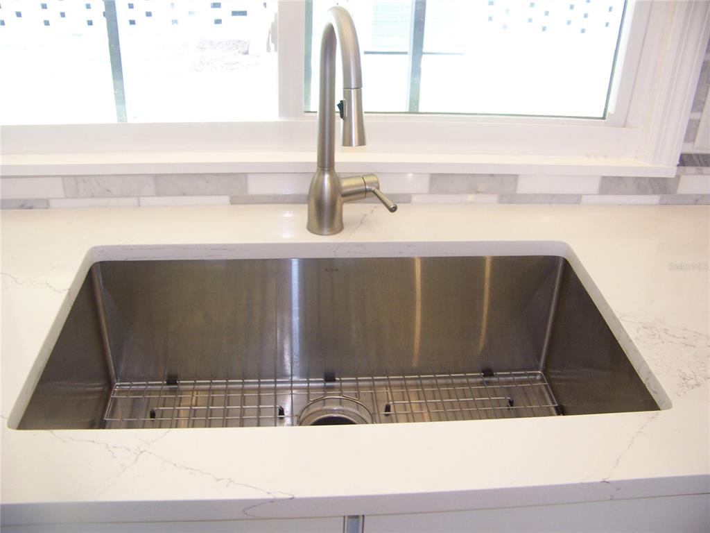 15550 Burnt Store Road, Unit 202 Punta Gorda, FL 33955 - Photo 15 of 61 a closeup of a sink