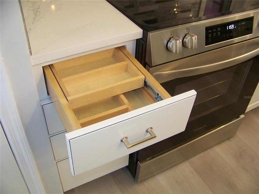 15550 Burnt Store Road, Unit 202 Punta Gorda, FL 33955 - Photo 23 of 61 a utility room with dryer and washer