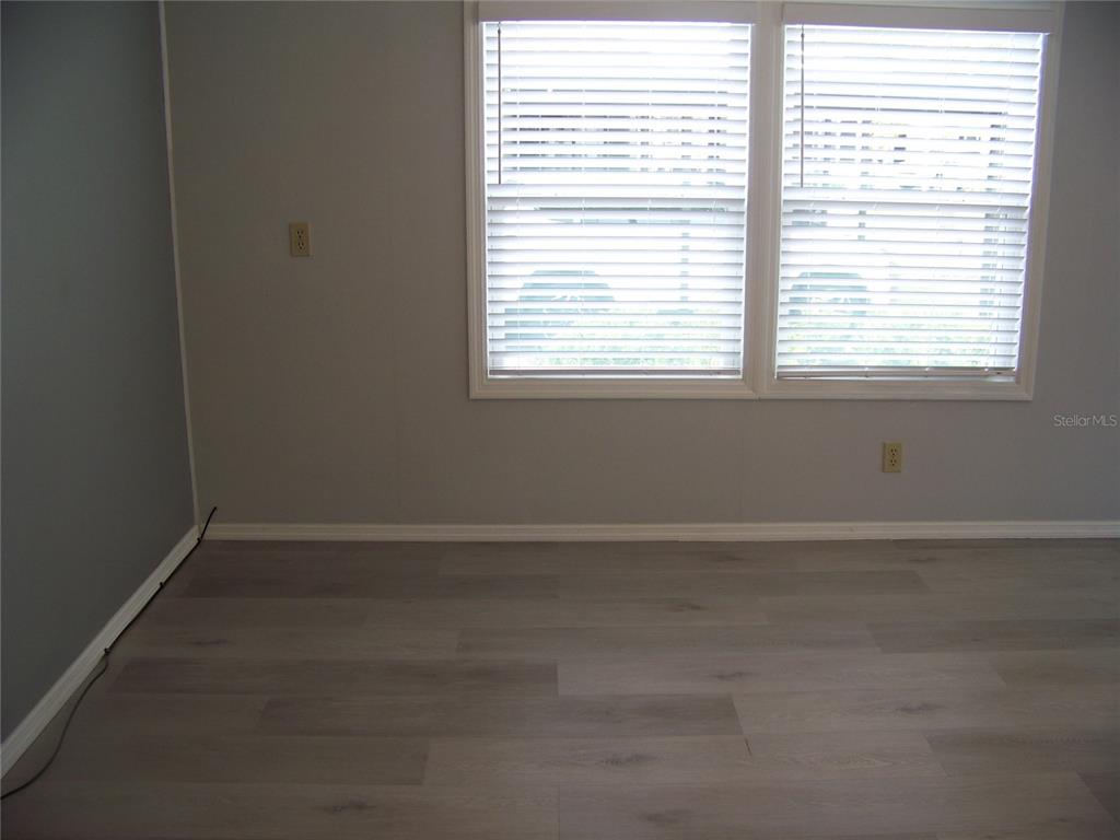 15550 Burnt Store Road, Unit 202 Punta Gorda, FL 33955 - Photo 26 of 61 an empty room with a window