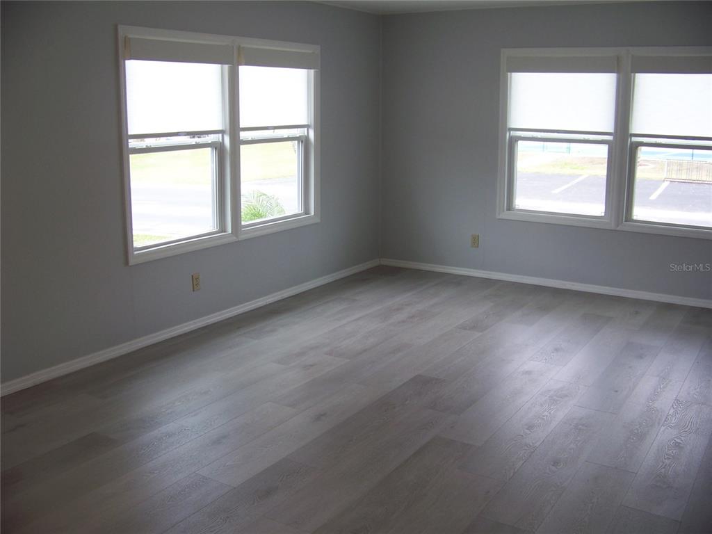 15550 Burnt Store Road, Unit 202 Punta Gorda, FL 33955 - Photo 27 of 61 an empty room with a window