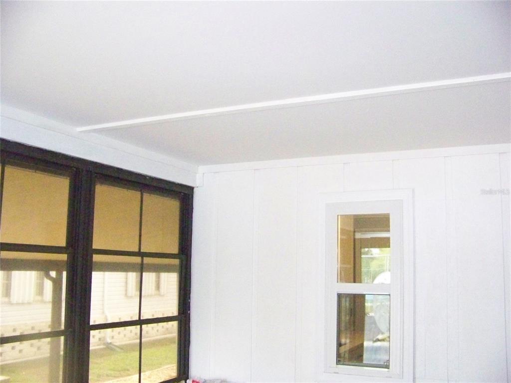 15550 Burnt Store Road, Unit 202 Punta Gorda, FL 33955 - Photo 30 of 61 a view of an empty room with a window