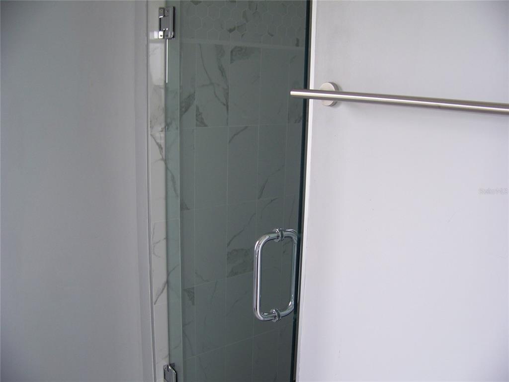 15550 Burnt Store Road, Unit 202 Punta Gorda, FL 33955 - Photo 43 of 61 a close view of shower tap