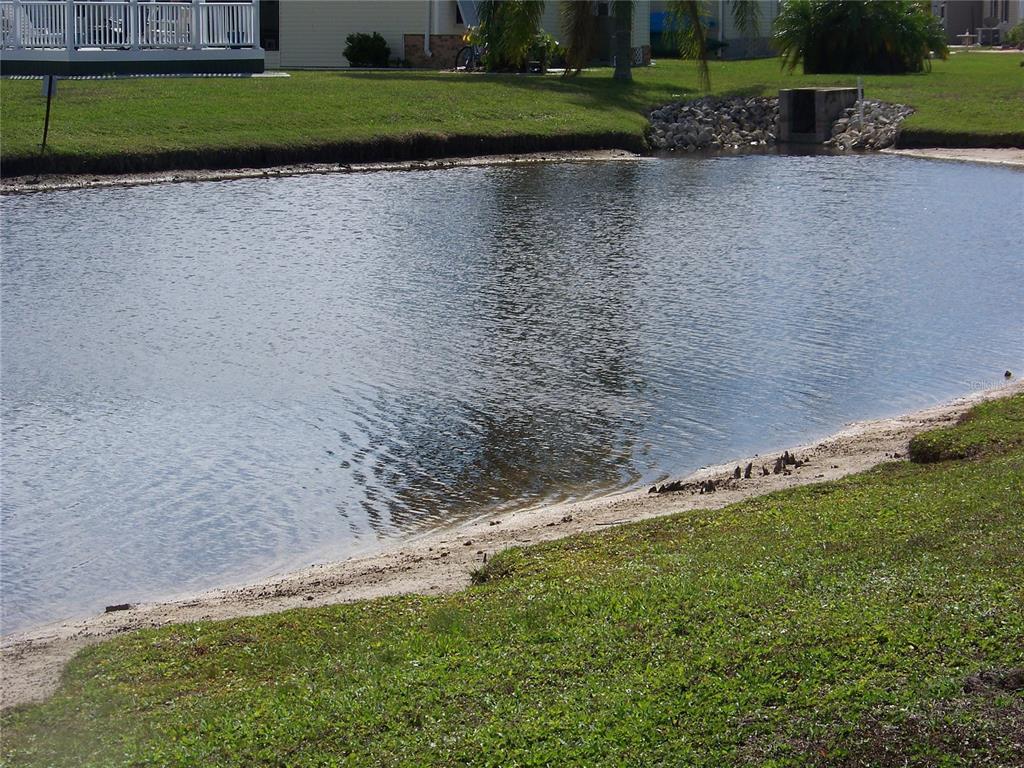 15550 Burnt Store Road, Unit 202 Punta Gorda, FL 33955 - Photo 5 of 61 a view of a field with a park