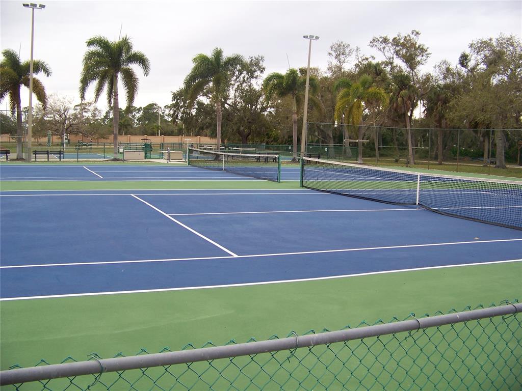 15550 Burnt Store Road, Unit 202 Punta Gorda, FL 33955 - Photo 54 of 61 a tennis court that has tennis net