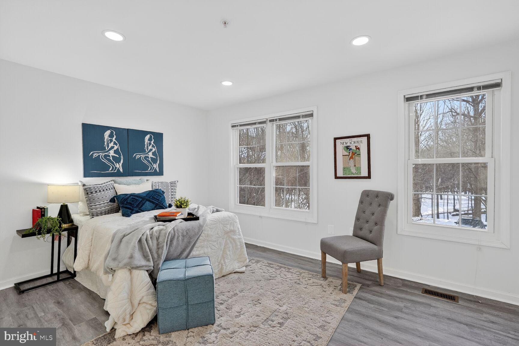 20415 Boulder Ridge Terrace Gaithersburg, MD 20882 - Photo 16 of 24 a bedroom with furniture and a window