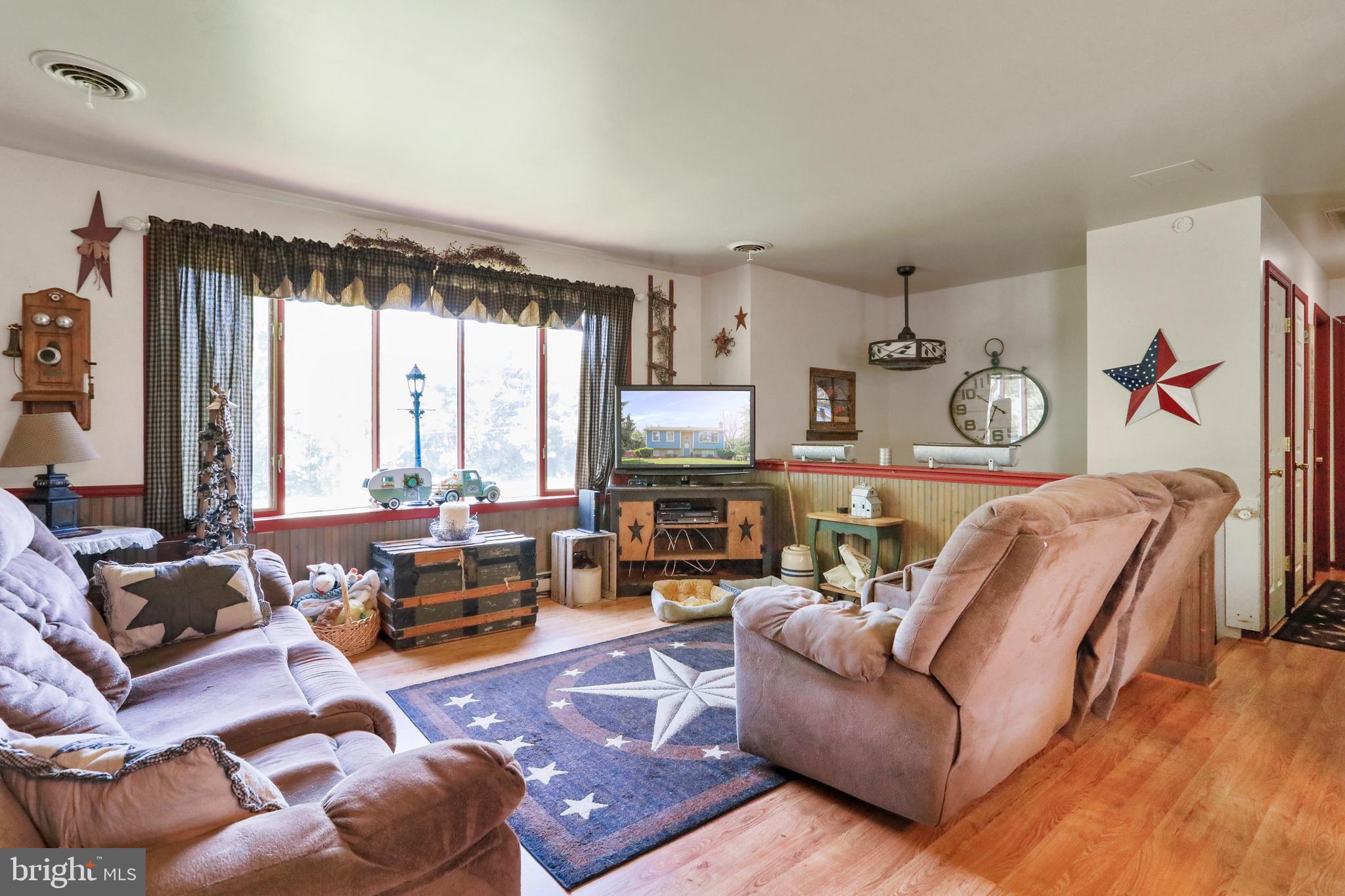 8311 Mapleville Road Boonsboro, MD 21713 - Photo 29 of 64 Living room with bow window.