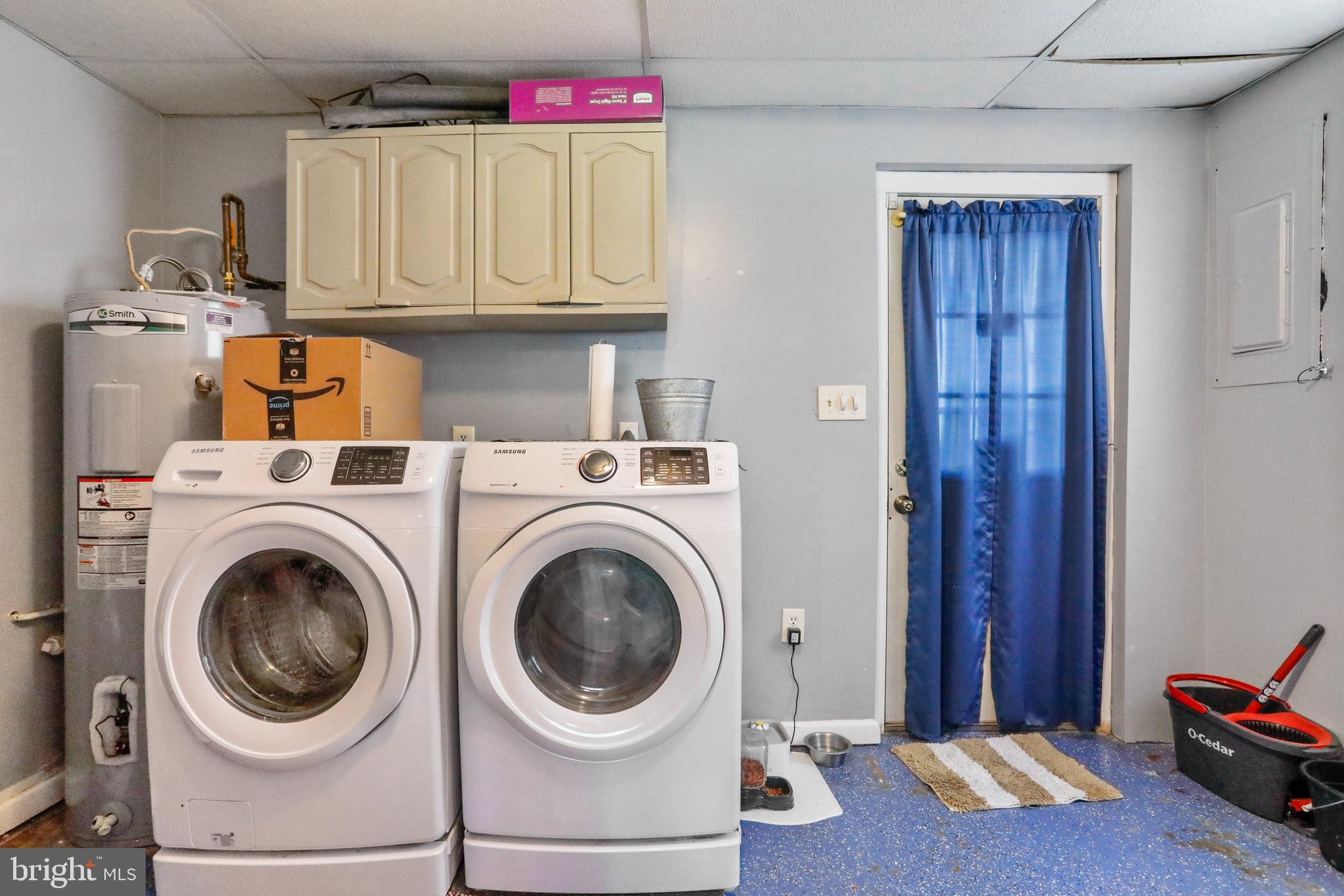 8311 Mapleville Road Boonsboro, MD 21713 - Photo 55 of 64 Separate laundry room with walk out to back yard.