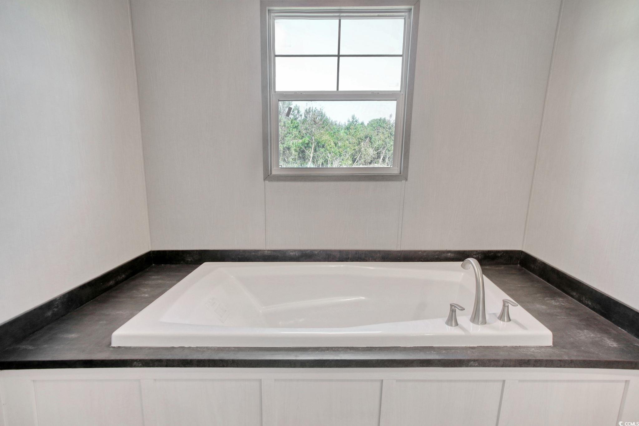 280 Samuel Road Loris, SC 29569 - Photo 15 of 29 Bathroom with a bath