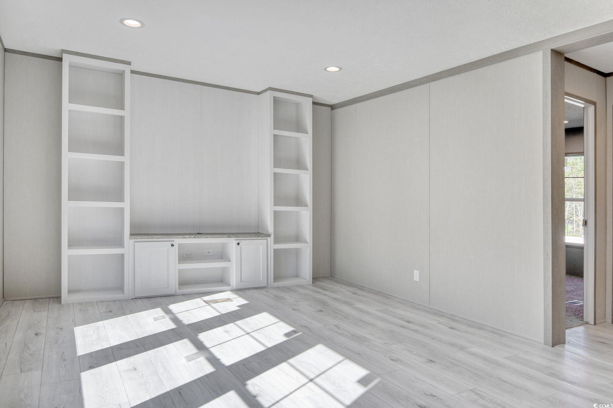 280 Samuel Road Loris, SC 29569 - Photo 24 of 29 Unfurnished bedroom featuring built in desk, ornam