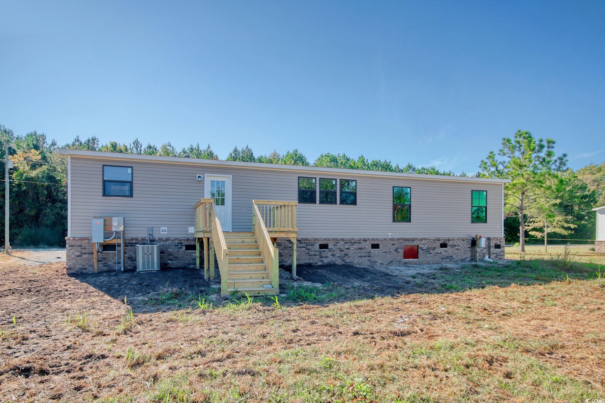 280 Samuel Road Loris, SC 29569 - Photo 27 of 29 View of front of house featuring cooling unit