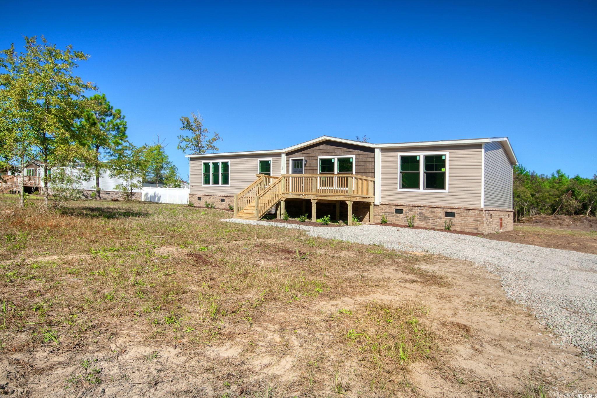 280 Samuel Road Loris, SC 29569 - Photo 3 of 29 Back of property with a deck