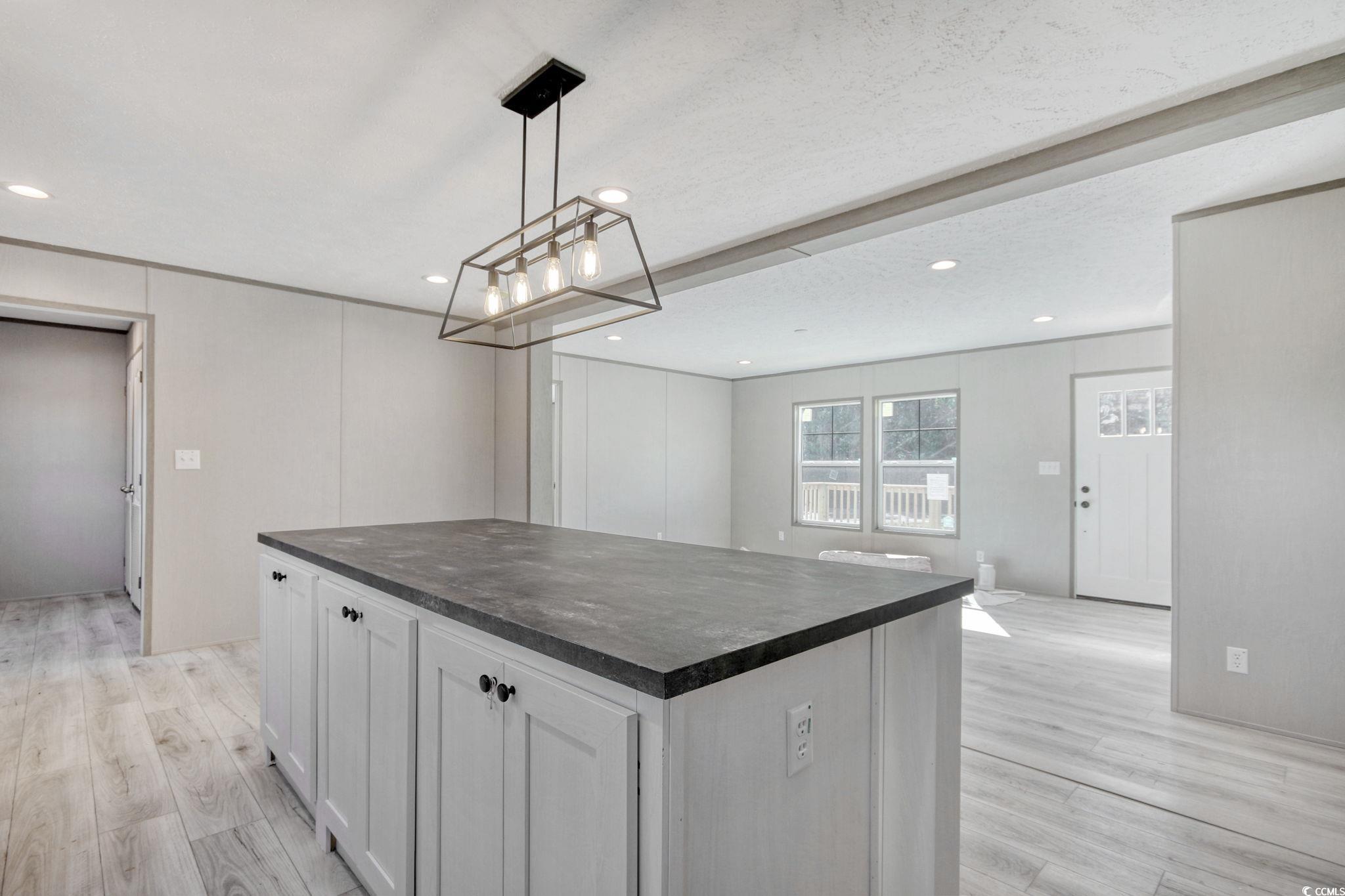 280 Samuel Road Loris, SC 29569 - Photo 10 of 29 Kitchen with light hardwood / wood-style flooring,
