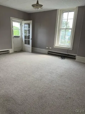 an empty room with windows