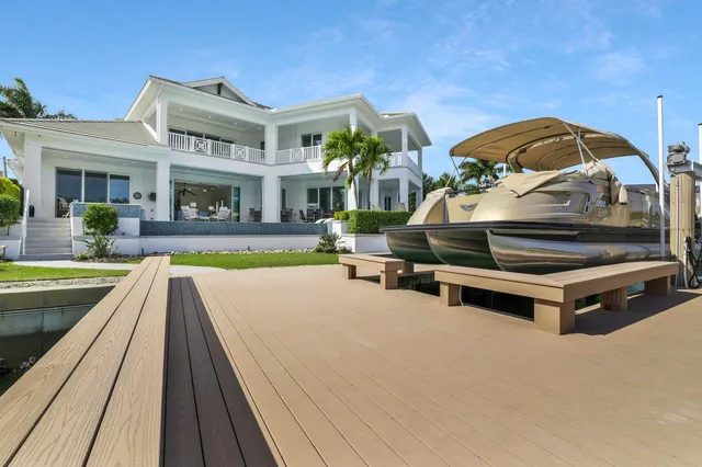 a view of a chairs and table in patio