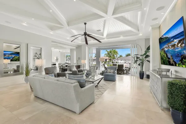 a living room with fireplace furniture and a flat screen tv