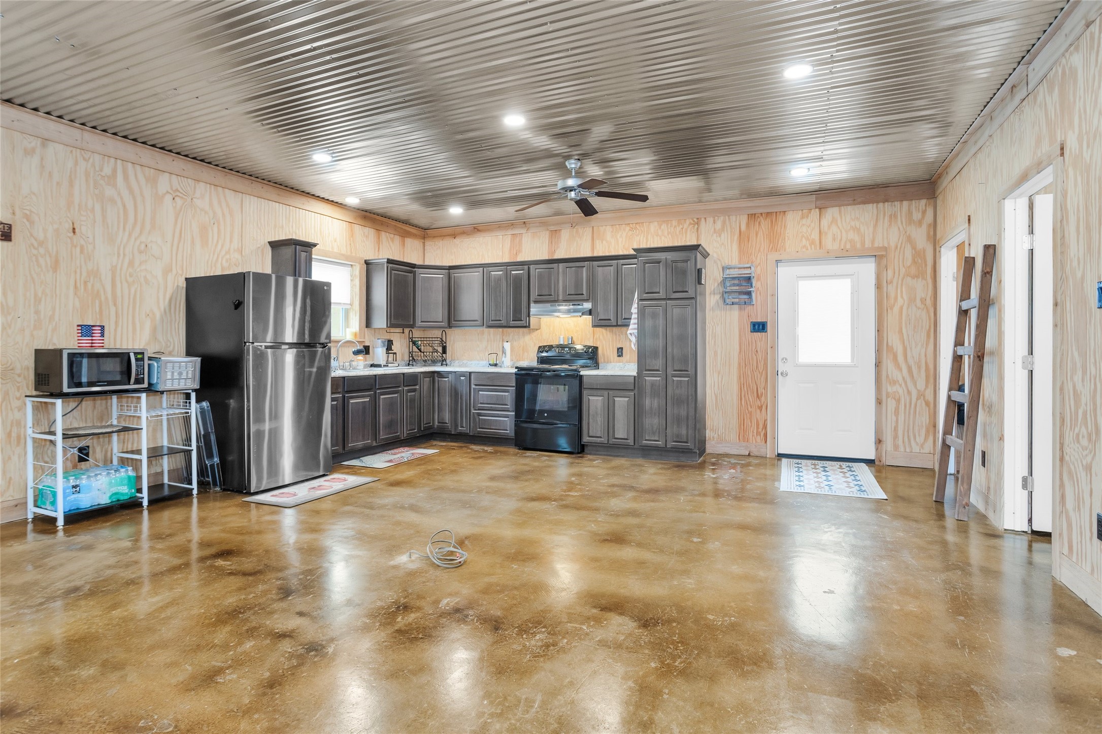 11781 Walding Road Montgomery, TX 77356 - Photo 38 of 47 A full kitchen in the guest home is perfect for multi-generational living or rental income.