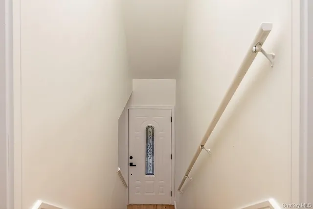 a view of entryway with a white wall