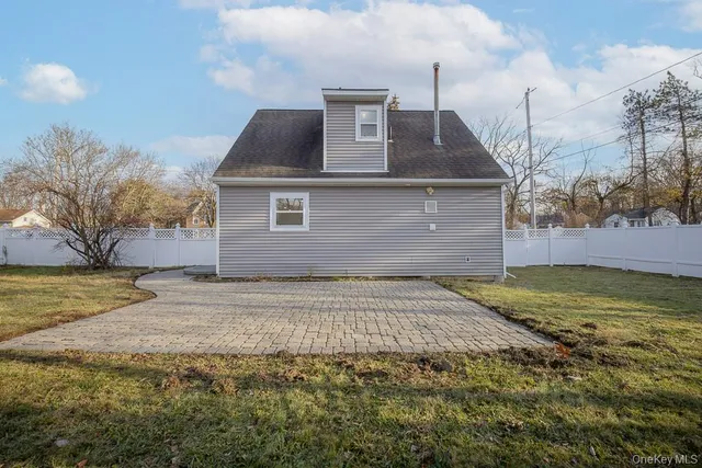 a front view of house with yard