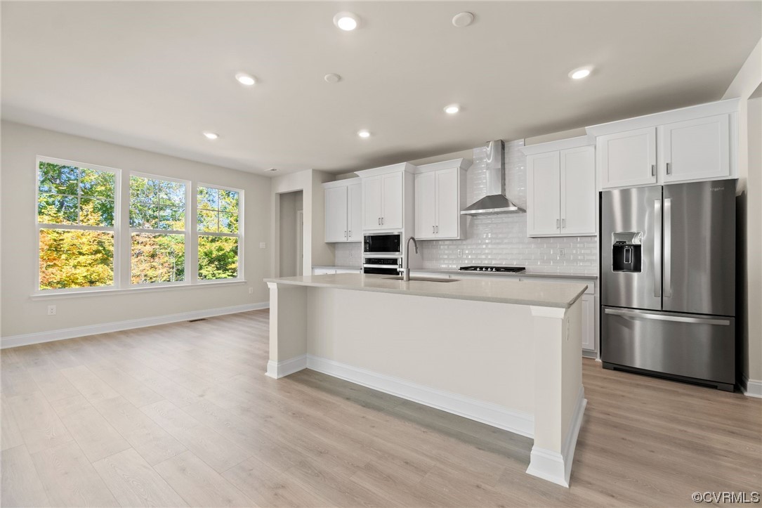 12812 Lonan Avenue Chesterfield, VA 23838 - Photo 16 of 49 a kitchen with stainless steel appliances granite countertop a refrigerator sink and stove
