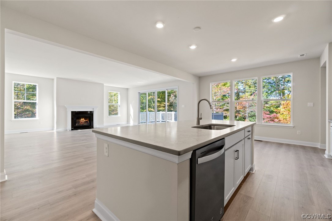 12812 Lonan Avenue Chesterfield, VA 23838 - Photo 17 of 49 a kitchen with stainless steel appliances granite countertop a sink and a stove