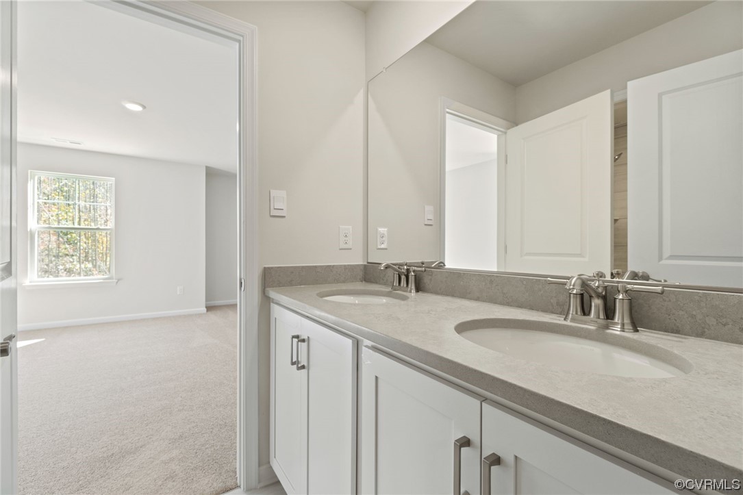12812 Lonan Avenue Chesterfield, VA 23838 - Photo 33 of 49 a bathroom with a granite countertop sink and a mirror
