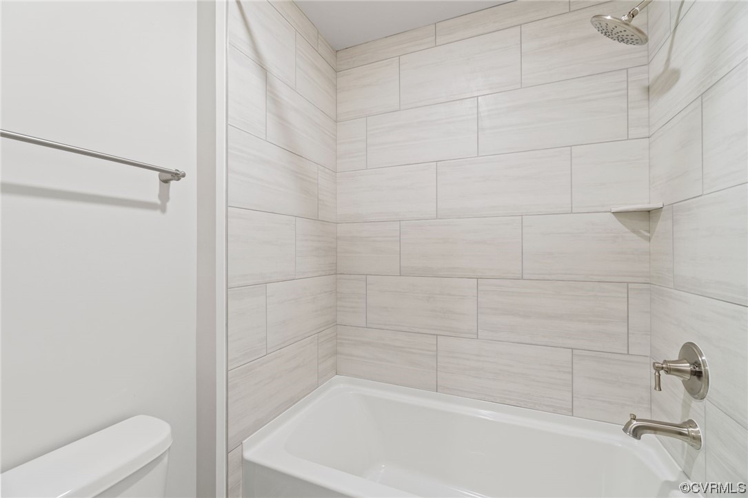 12812 Lonan Avenue Chesterfield, VA 23838 - Photo 34 of 49 a bathroom with a bathtub and toilet